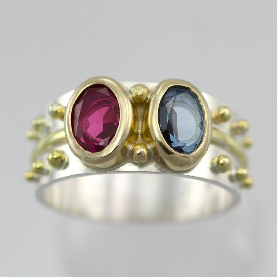 Vintage Ring mit blauem und rotem Kristall